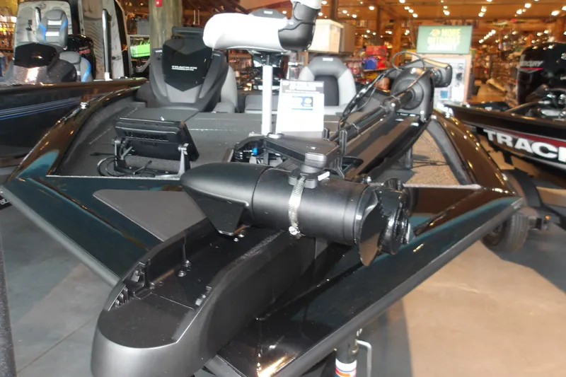 Slide: The Image of 2026 Tracker Pro Team 175 Crappie Edition boat displayed indoors. - 15