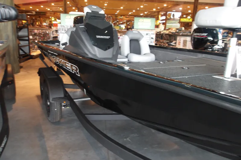 Slide: The Image of 2026 Tracker Pro Team 175 Crappie Edition boat displayed indoors. - 17