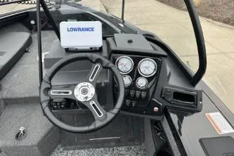 Slide: The Image of 2026 Tracker Targa V-18 Combo boat dashboard with Lowrance navigation system. - 6