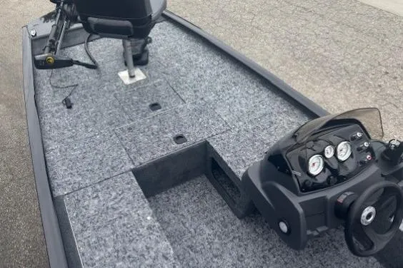 Slide: The Image of 2026 Tracker Pro 170 boat interior with steering console and seating. - 5