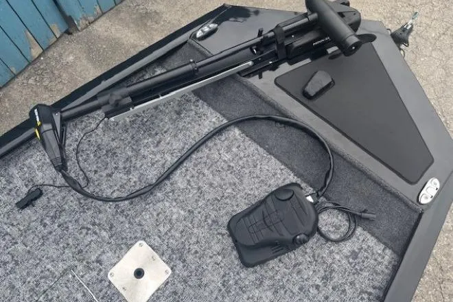 Slide: The Image of 2026 Tracker Pro 170 boat deck with trolling motor and foot pedal. - 6