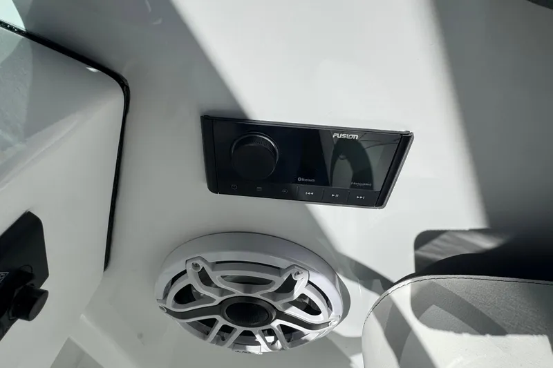 Slide: The Image of 2026 Stingray 259 DC boat audio system with Fusion Bluetooth stereo and speaker. - 12