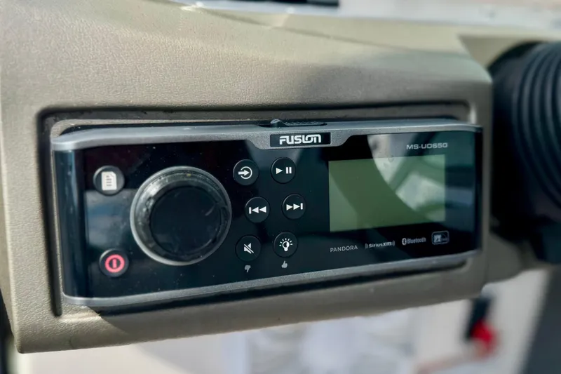 Slide: The Image of Fusion MS-UD650 stereo system on 2013 Regal 21 OBX boat dashboard. - 6