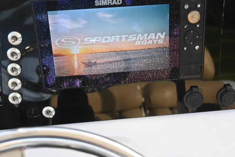 Slide: The Image of Simrad display on 2018 Sportsman Open 232 Center Console boat dashboard. - 14