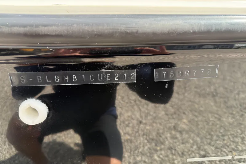 Slide: The Image of 2012 Bayliner 175 boat hull identification number on display. - 19