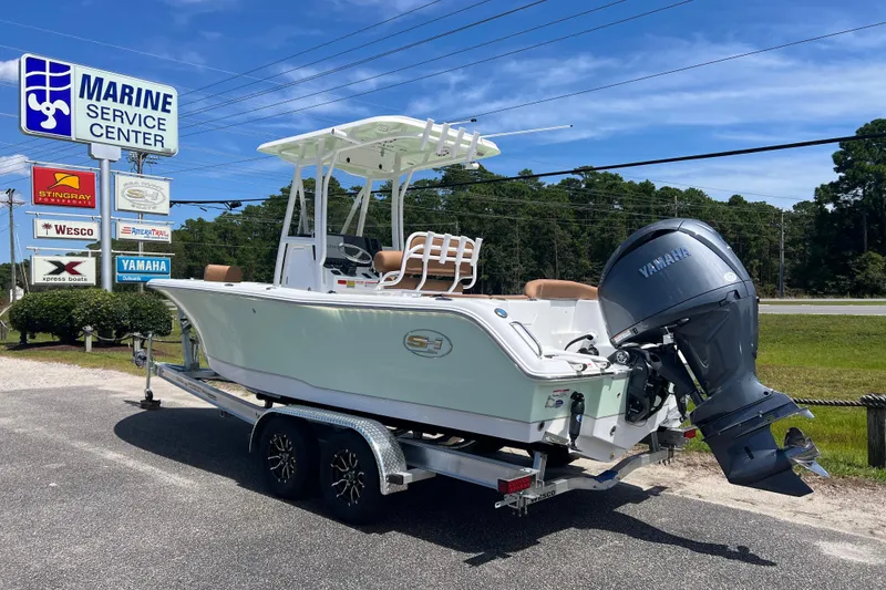 Slide: The Image of 2026 Sea Hunt Ultra 229 boat on trailer at Marine Service Center. - 3