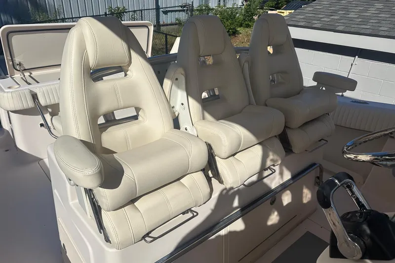 Slide: The Image of 2008 Grady-White Canyon 336 boat with three luxurious white captain's chairs. - 6