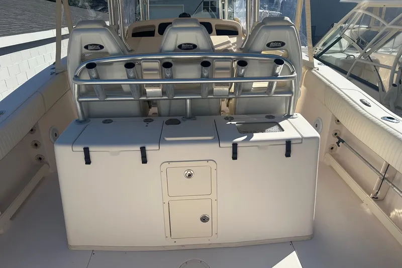 Slide: The Image of 2008 Grady-White Canyon 336 boat interior with seating and storage compartments. - 9