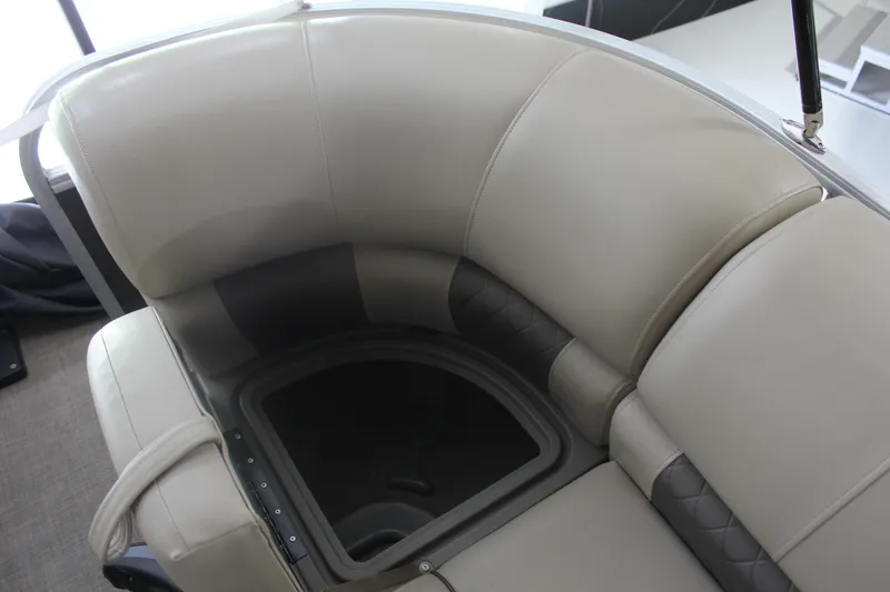 Slide: The Image of 2023 Sun Tracker Party Barge 22 RF DLX seating with storage compartment. - 25