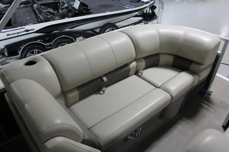 Slide: The Image of 2023 Sun Tracker Party Barge 22 RF DLX, luxurious beige seating with cup holder. - 3