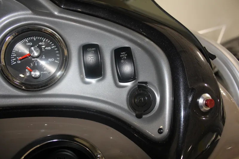 Slide: The Image of Dashboard of 2023 Sun Tracker Party Barge 22 RF DLX with speedometer and switches. - 7