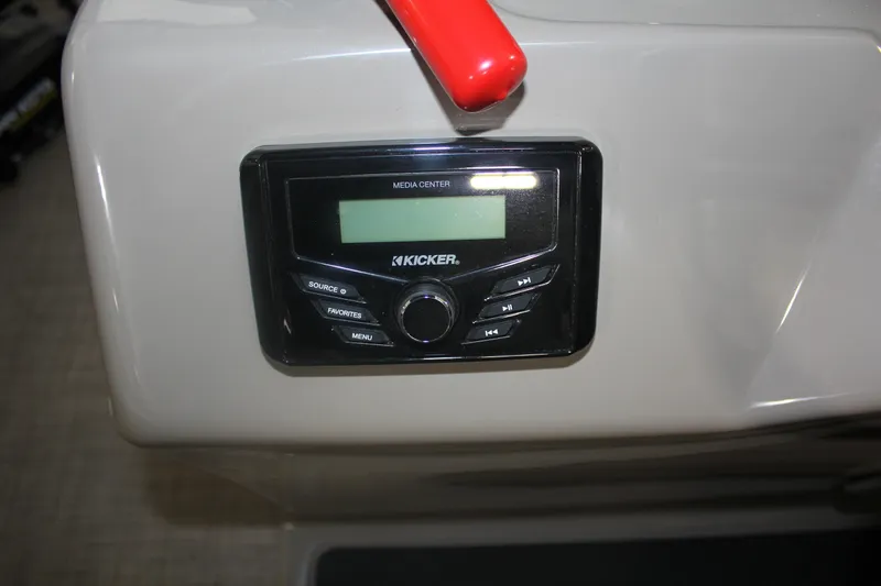 Slide: The Image of Kicker media center on 2023 Sun Tracker Party Barge 22 RF DLX boat console. - 8