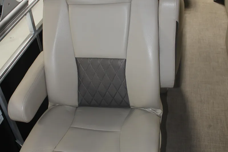 Slide: The Image of 2023 Sun Tracker Party Barge 22 RF DLX seat with diamond-patterned upholstery. - 9