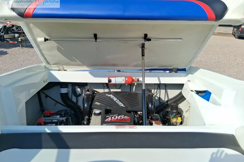 Slide: The Image of Open engine compartment of 2007 Baja 245 boat with MerCruiser 496 MAG engine. - 10