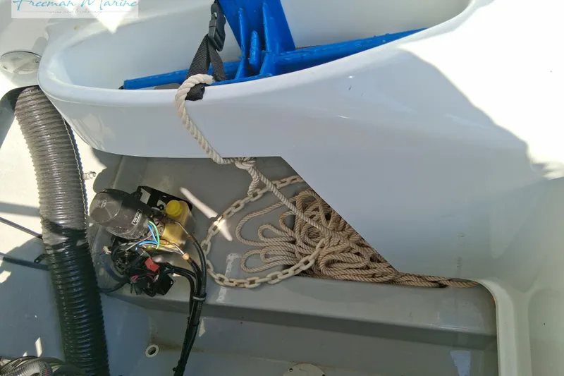Slide: The Image of 2007 Baja 245 boat interior showing ropes and mechanical components. - 27