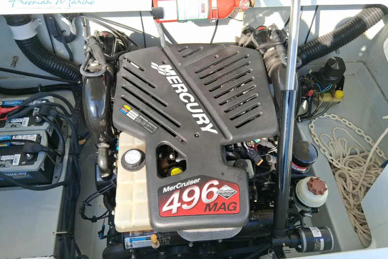Slide: The Image of Engine compartment of a 2007 Baja 245 boat with MerCruiser 496 MAG engine. - 5