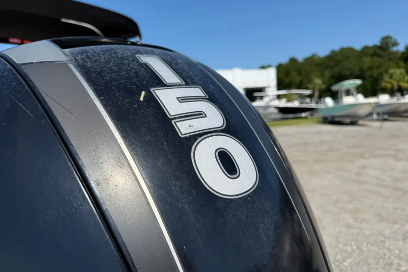 Slide: The Image of Close-up of a 150 horsepower outboard motor on a 2017 Sea Ray SPX 190 boat. - 8