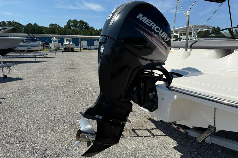 Slide: The Image of 2017 Sea Ray SPX 190 Outboard with Mercury engine in a boatyard setting. - 9