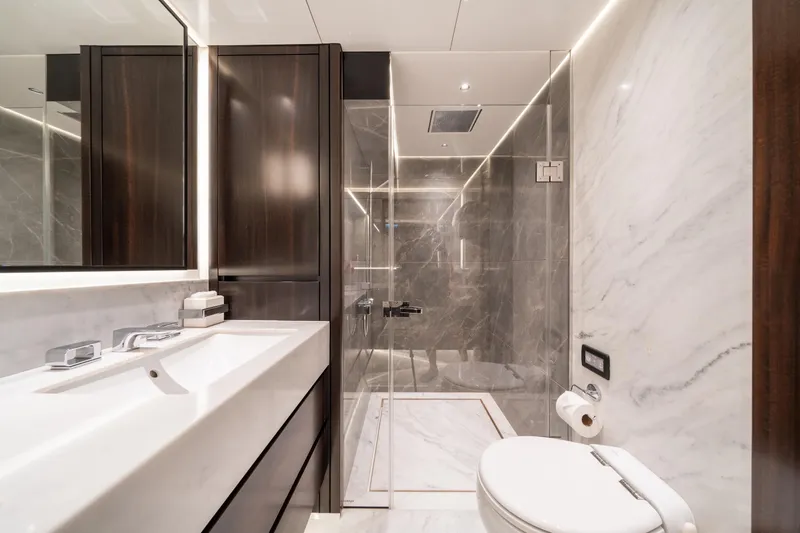 Slide: The Image of Luxurious bathroom in 2023 Sunseeker 90 Ocean yacht with marble and modern fixtures. - 27