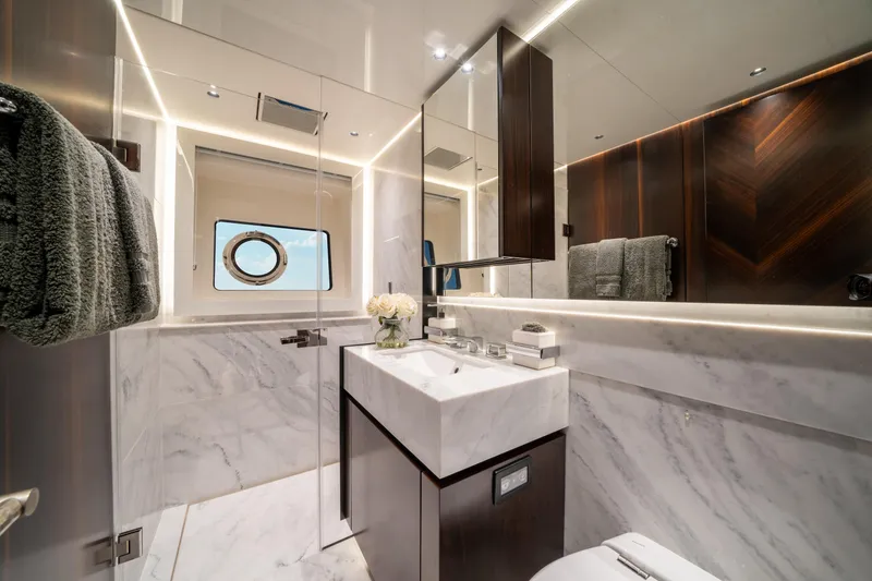 Slide: The Image of Luxurious bathroom in 2023 Sunseeker 90 Ocean yacht with marble and wood accents. - 33