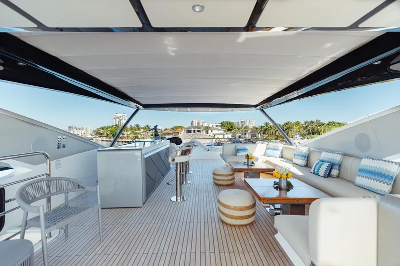 Slide: The Image of Luxurious Sunseeker 90 Ocean yacht deck with modern seating, 2023 model. - 36