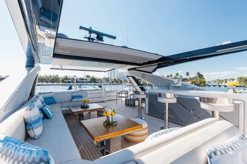 Slide: The Image of Luxurious 2023 Sunseeker 90 Ocean yacht deck with elegant seating and ocean view. - 37