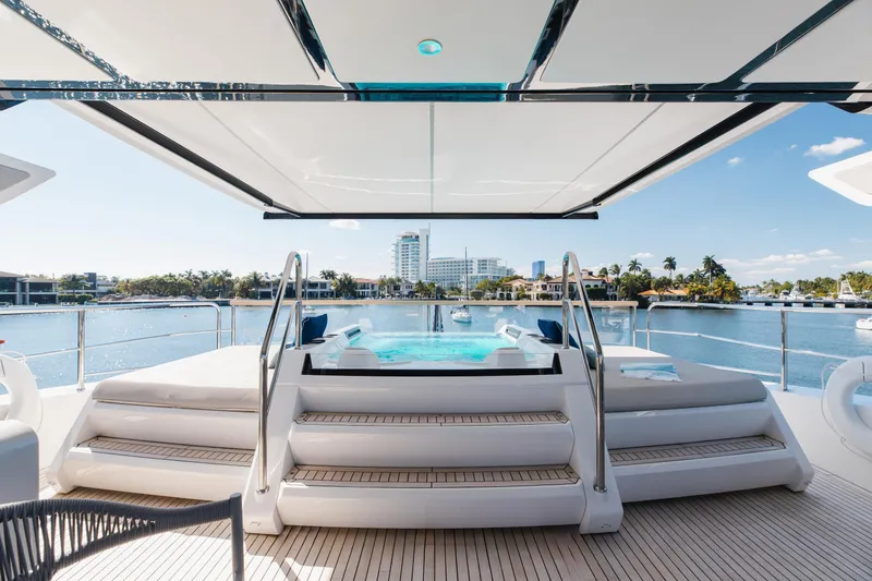 Slide: The Image of Luxurious 2023 Sunseeker 90 Ocean yacht with pool, overlooking scenic waterfront. - 39