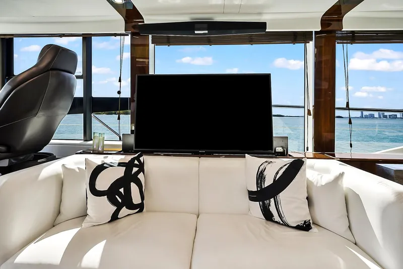 Slide: The Image of Luxurious interior of 2021 Fairline Squadron 68 yacht with modern decor and ocean view. - 25