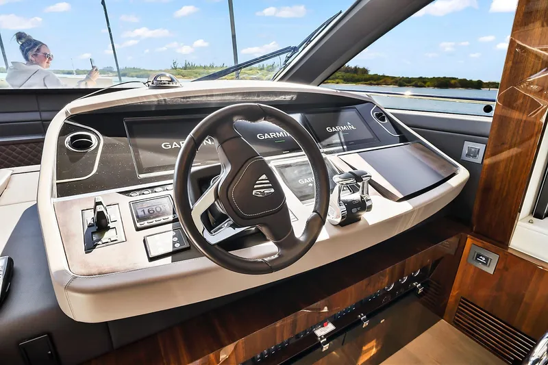 Slide: The Image of Helm of 2021 Fairline Squadron 68 yacht with Garmin navigation system. - 26
