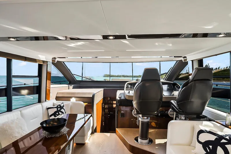 Slide: The Image of Luxurious interior of 2021 Fairline Squadron 68 yacht with modern helm and seating. - 27