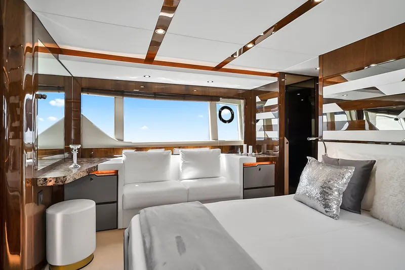 Slide: The Image of Luxurious interior of 2021 Fairline Squadron 68 yacht with elegant furnishings and large windows. - 30