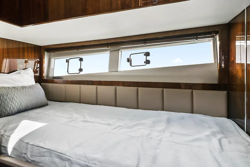 Slide: The Image of Luxurious cabin interior of 2021 Fairline Squadron 68 yacht with elegant bedding. - 35