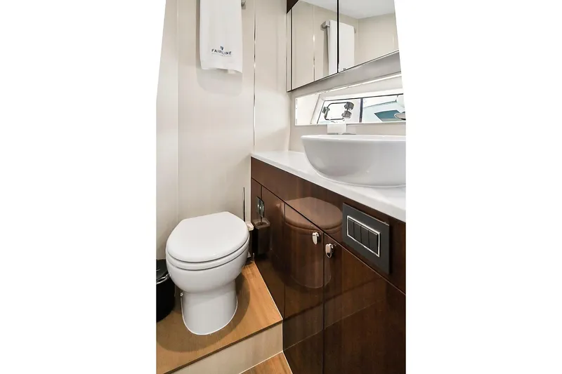 Slide: The Image of Luxurious bathroom in 2021 Fairline Squadron 68 yacht, featuring modern fixtures and elegant design. - 36