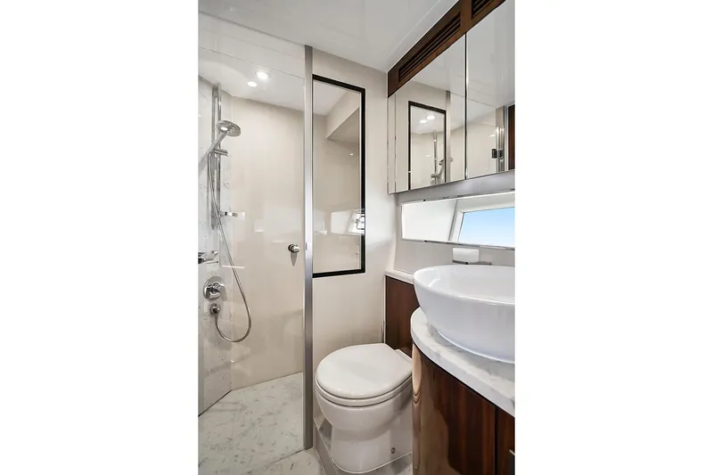 Slide: The Image of Luxurious bathroom in 2021 Fairline Squadron 68 yacht with modern fixtures and elegant design. - 40
