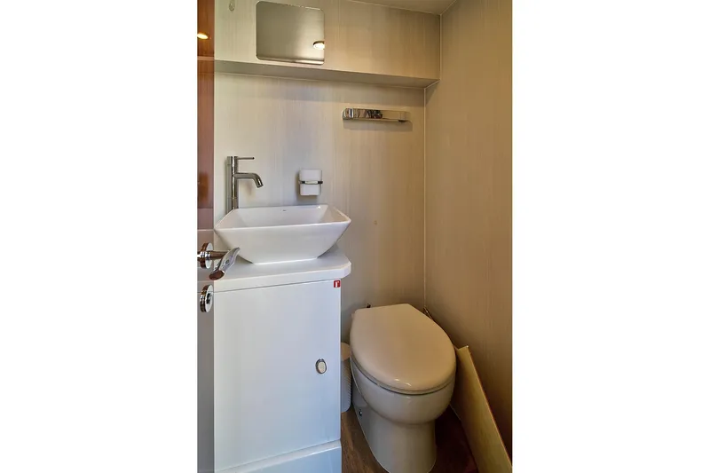 Slide: The Image of Modern bathroom in 2021 Fairline Squadron 68 yacht, featuring sleek sink and toilet. - 42