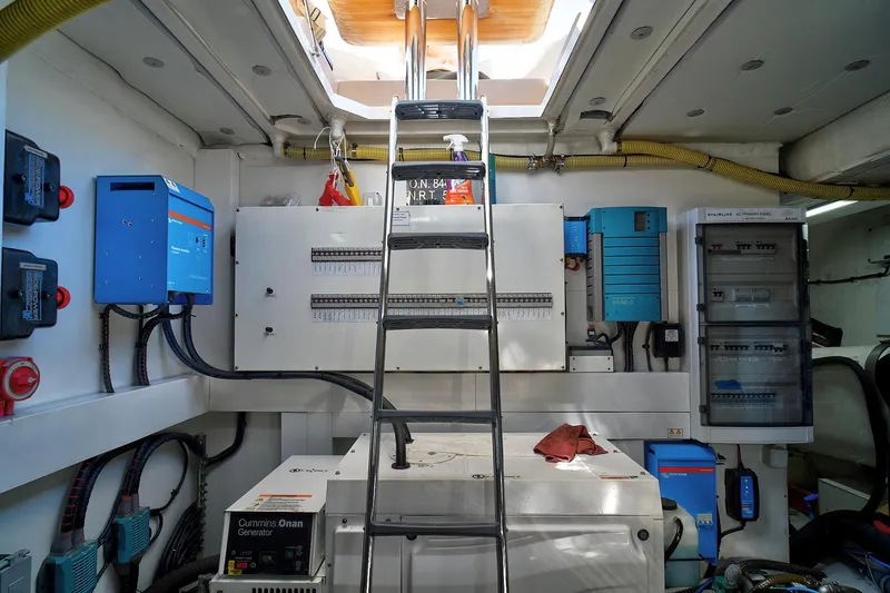 Slide: The Image of Engine room of 2021 Fairline Squadron 68 yacht with electrical panels and generator. - 44