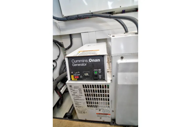 Slide: The Image of Cummins Onan generator in 2021 Fairline Squadron 68 yacht engine room. - 46