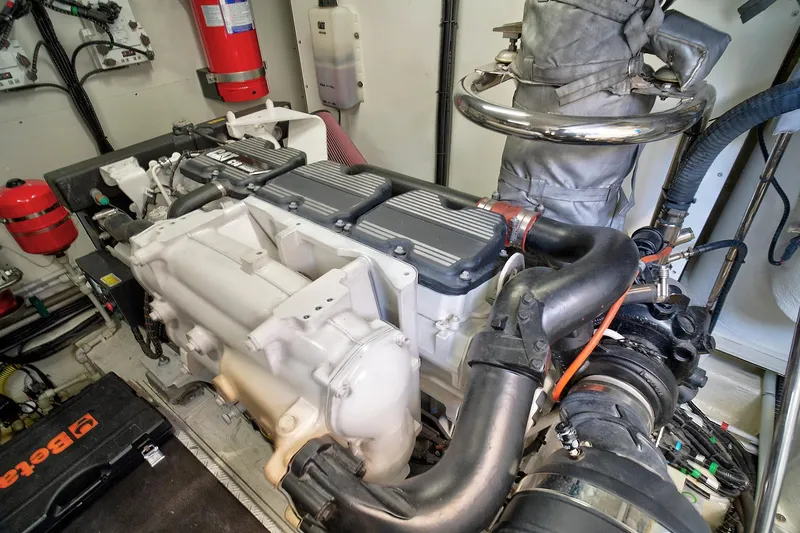 Slide: The Image of Engine room of 2021 Fairline Squadron 68 yacht, featuring advanced machinery and components. - 47