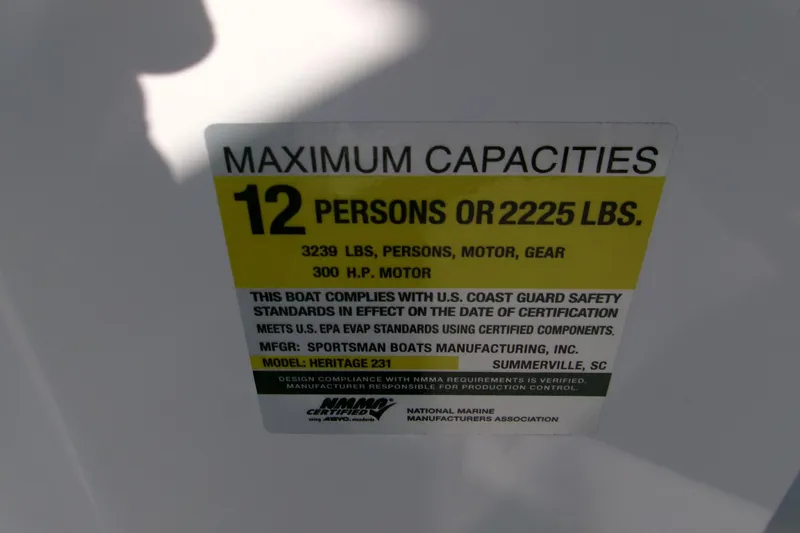 Slide: The Image of Capacity label for 2026 Sportsman Heritage 231 Center Console, 12 persons or 2225 lbs. - 15
