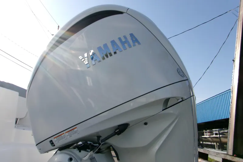Slide: The Image of 2026 Sportsman Heritage 231 Center Console with Yamaha outboard engine. - 4