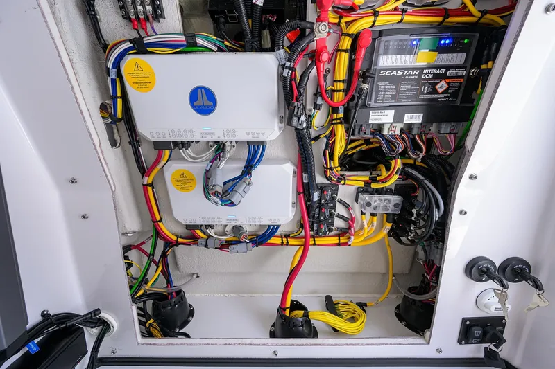 Slide: The Image of Electrical system of 2026 Sportsman Open 262 Center Console boat, featuring wiring and components. - 20