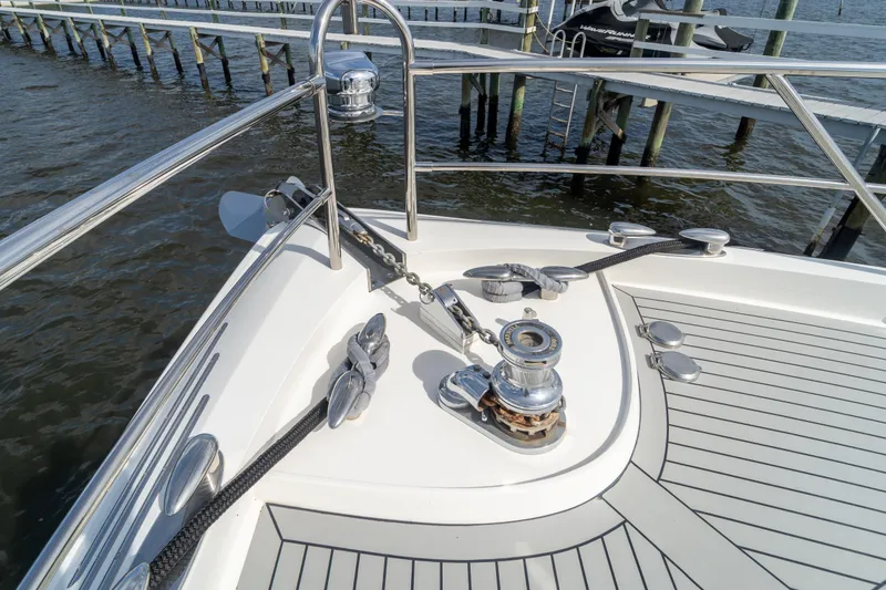 Slide: The Image of Bow of 2009 Lazzara LSX 75 yacht with anchor and railing details. - 17
