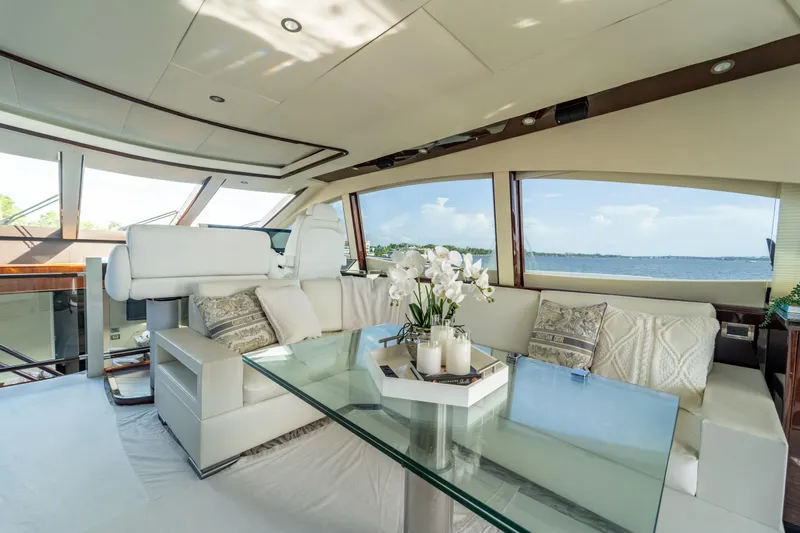 Slide: The Image of Luxurious interior of 2009 Lazzara LSX 75 yacht with elegant seating and ocean view. - 24