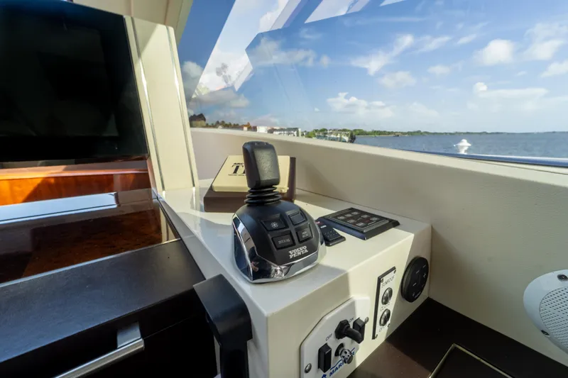 Slide: The Image of Control panel of a 2009 Lazzara LSX 75 yacht with scenic water view. - 30