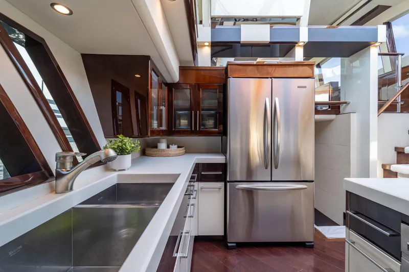 Slide: The Image of Luxurious kitchen interior of 2009 Lazzara LSX 75 yacht with modern appliances and sleek design. - 42