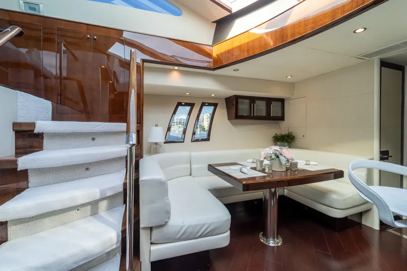Slide: The Image of Luxurious interior of 2009 Lazzara LSX 75 yacht with elegant dining area and staircase. - 43
