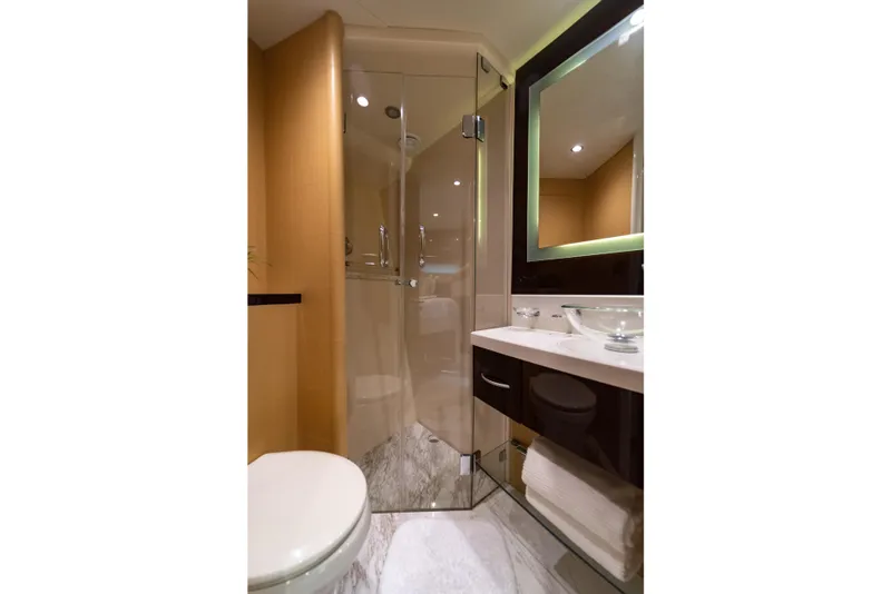 Slide: The Image of Luxurious bathroom in 2009 Lazzara LSX 75 yacht with modern fixtures and glass shower. - 45