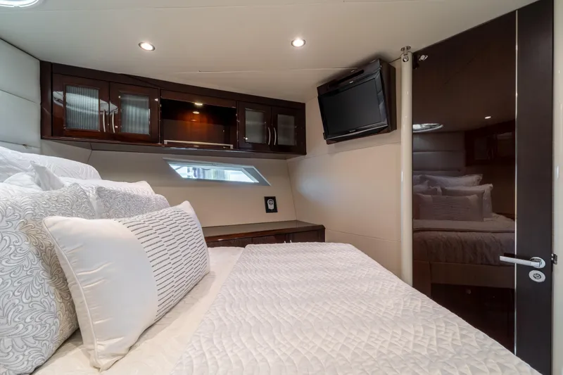 Slide: The Image of Luxurious bedroom interior of 2009 Lazzara LSX 75 yacht with elegant bedding and modern decor. - 46