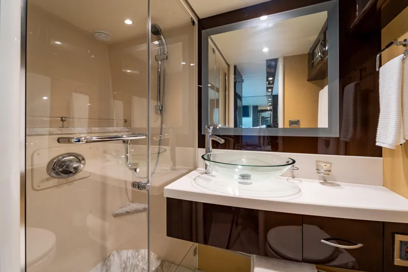 Slide: The Image of Luxurious bathroom in 2009 Lazzara LSX 75 yacht with glass sink and modern shower. - 51