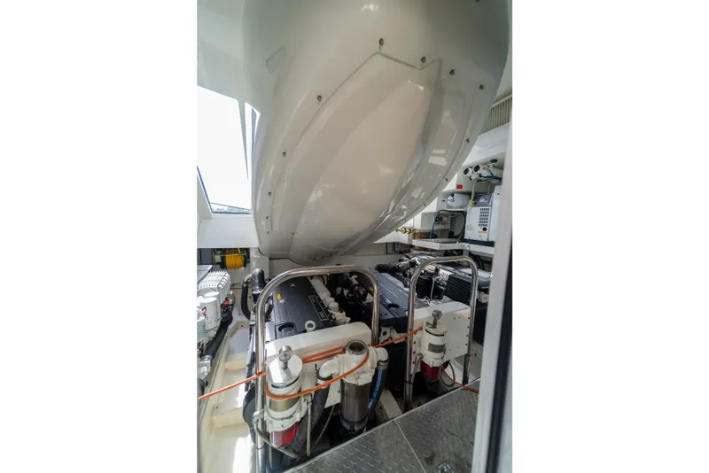 Slide: The Image of Engine room of 2009 Lazzara LSX 75 yacht, showcasing mechanical components and systems. - 68
